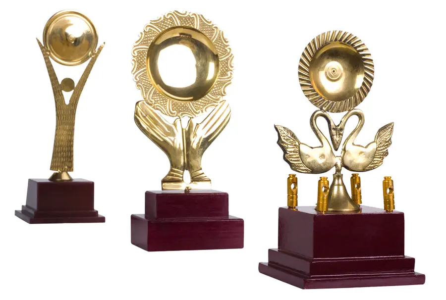 three winners trophies